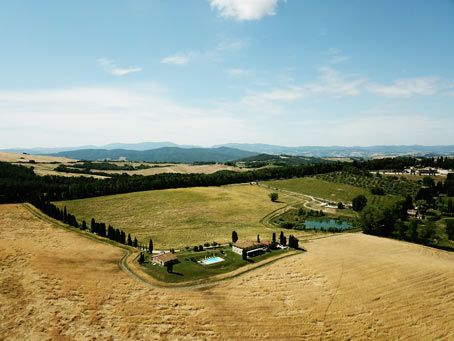 Tuscan farmhouse with a drone