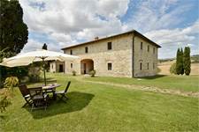 the villa with a teak table