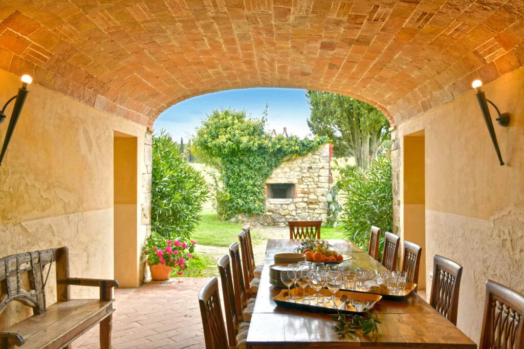 the wooden table of the ancient loggia